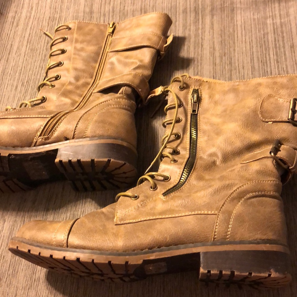 Lightly worn faux leather lace up boot